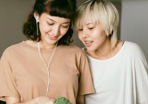 Two people cooking together.