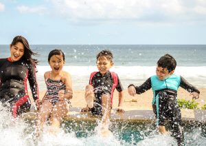 Kids playing at the beach.