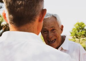 Grandfather and son meeting each other.