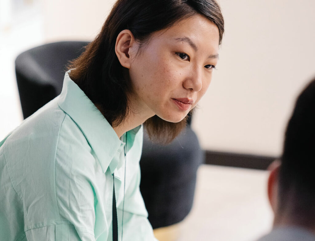 Person listening to someone else.