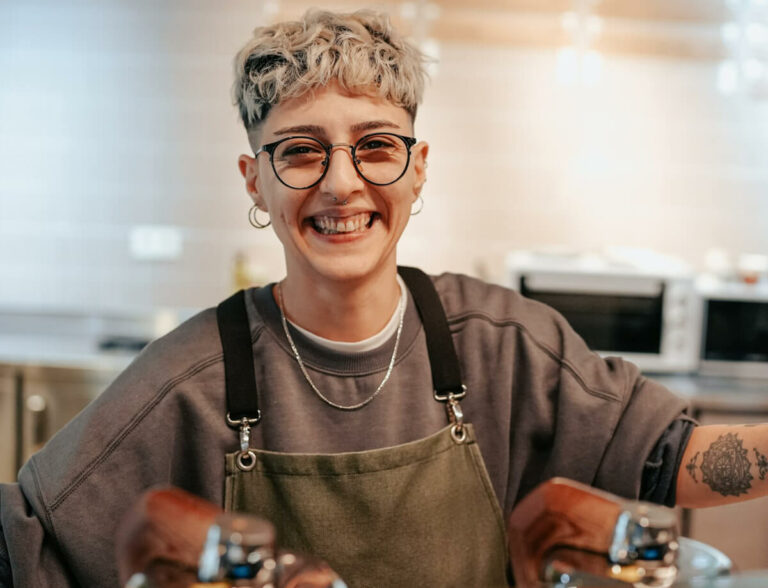 Young person working in a cafe.